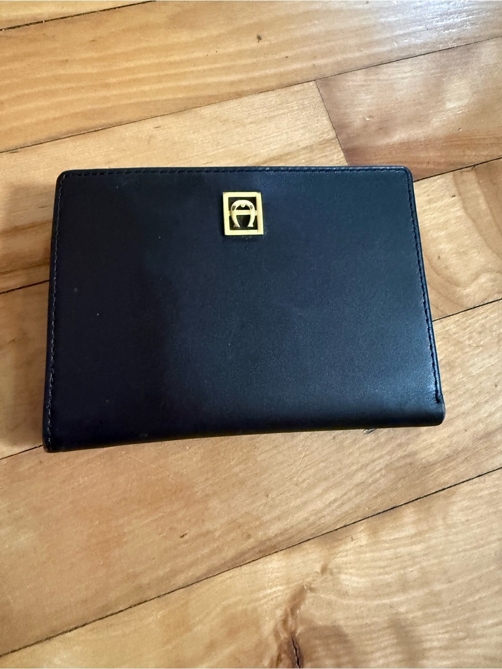 Etienne Aigner Black Leather Wallet with Gold Logo
